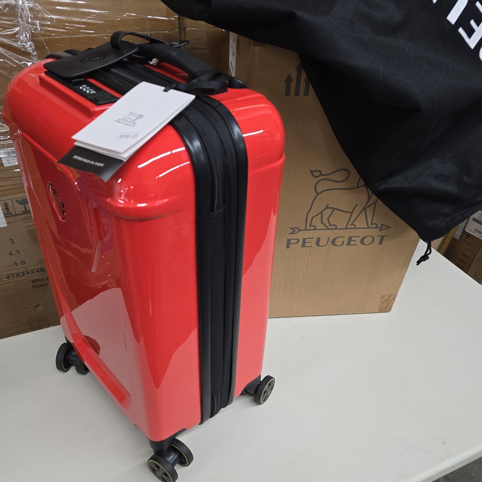 Orange PEUGEOT FRANCE  RED PEUGEUT Zip International Carry-On Spinner
