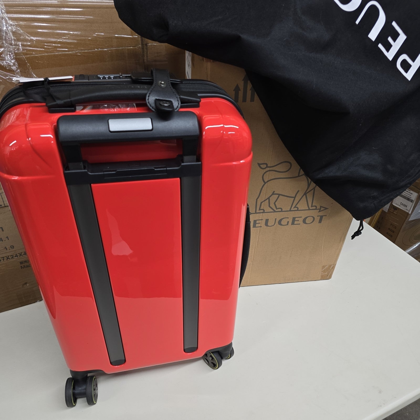 Orange PEUGEOT FRANCE  RED PEUGEUT Zip International Carry-On Spinner