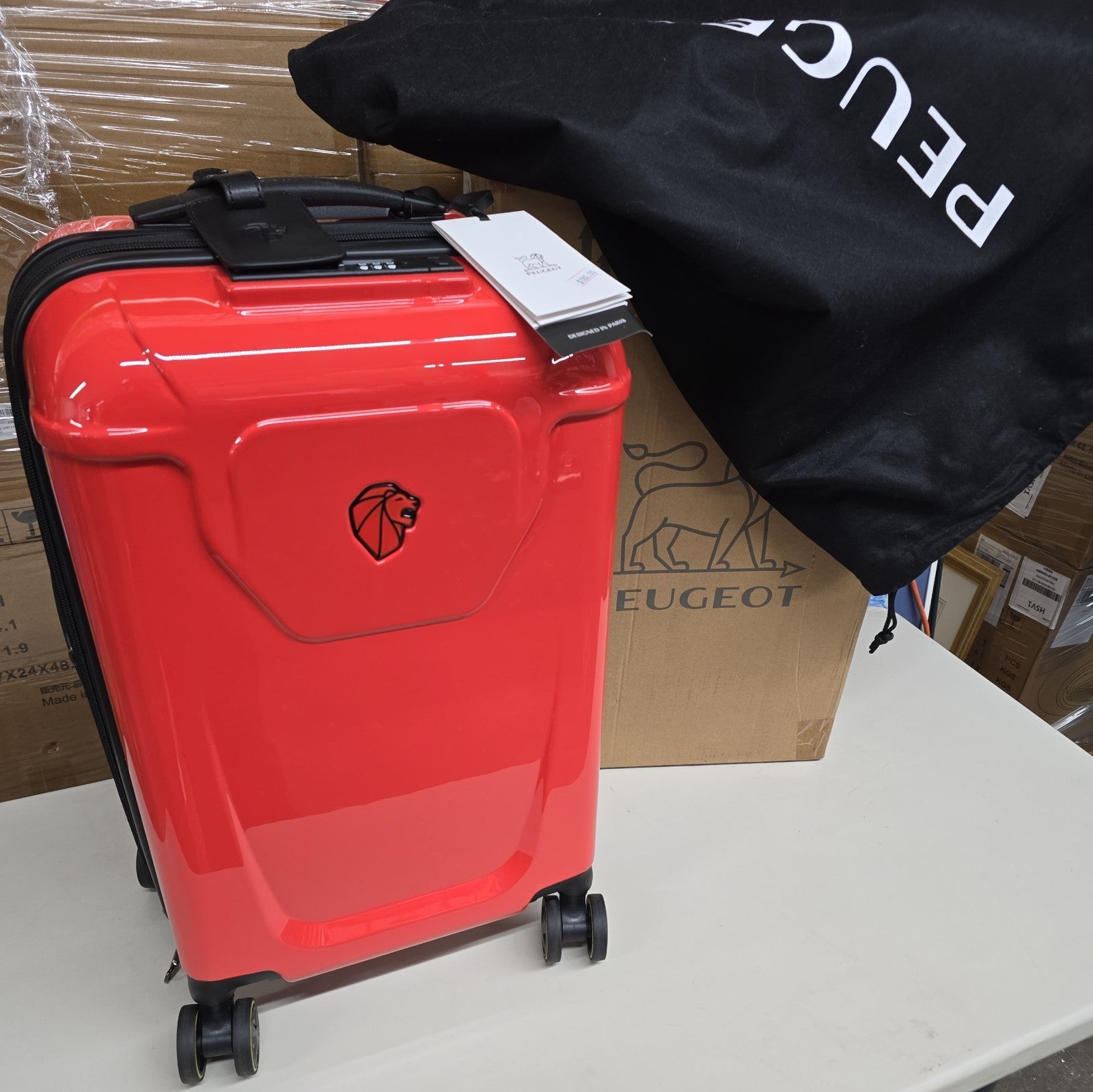 Orange PEUGEOT FRANCE  RED PEUGEUT Zip International Carry-On Spinner 